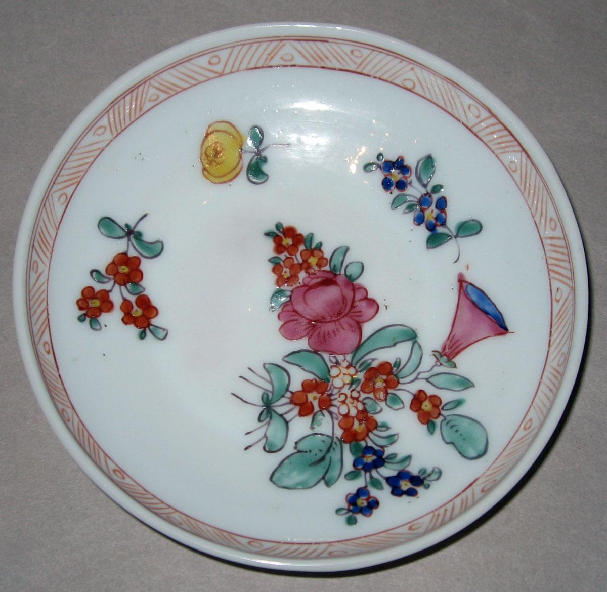 1958.1435 White glass saucer