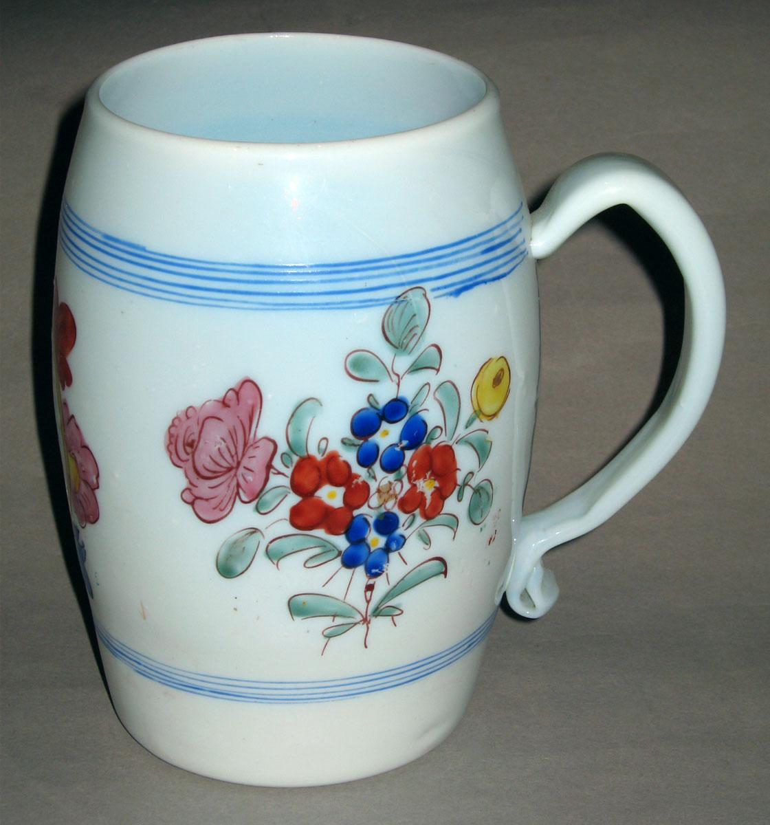 1958.1441 White glass mug (side)