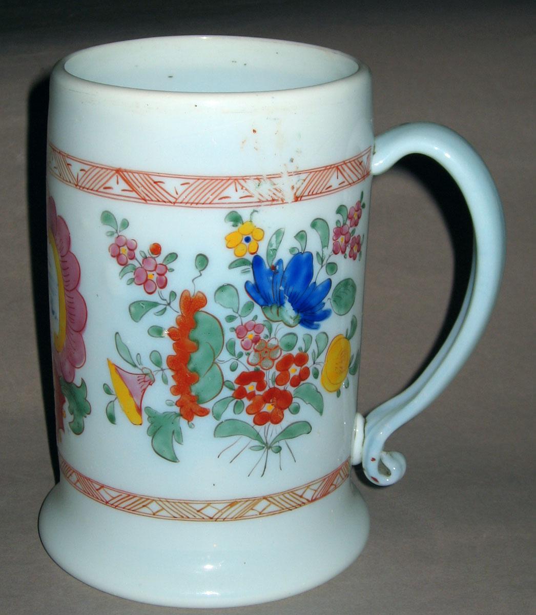 1958.1444 White glass mug (side)