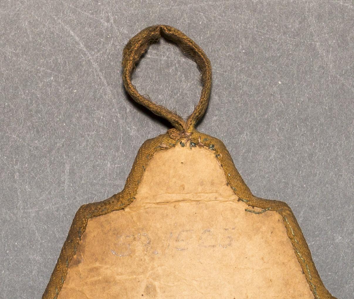 1958.1525 Wall pocket, reverse, detail 1