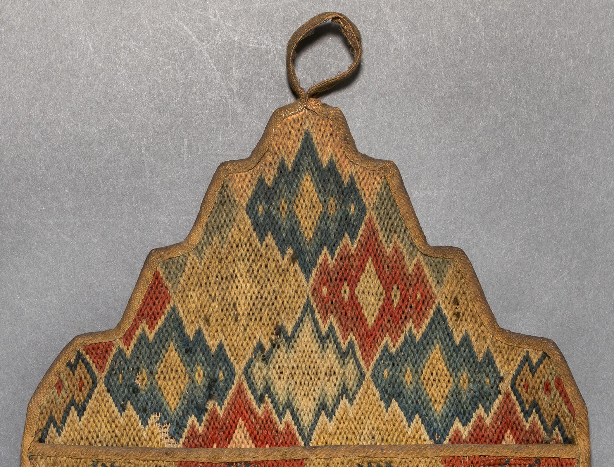 1958.1525 Wall pocket, detail 1