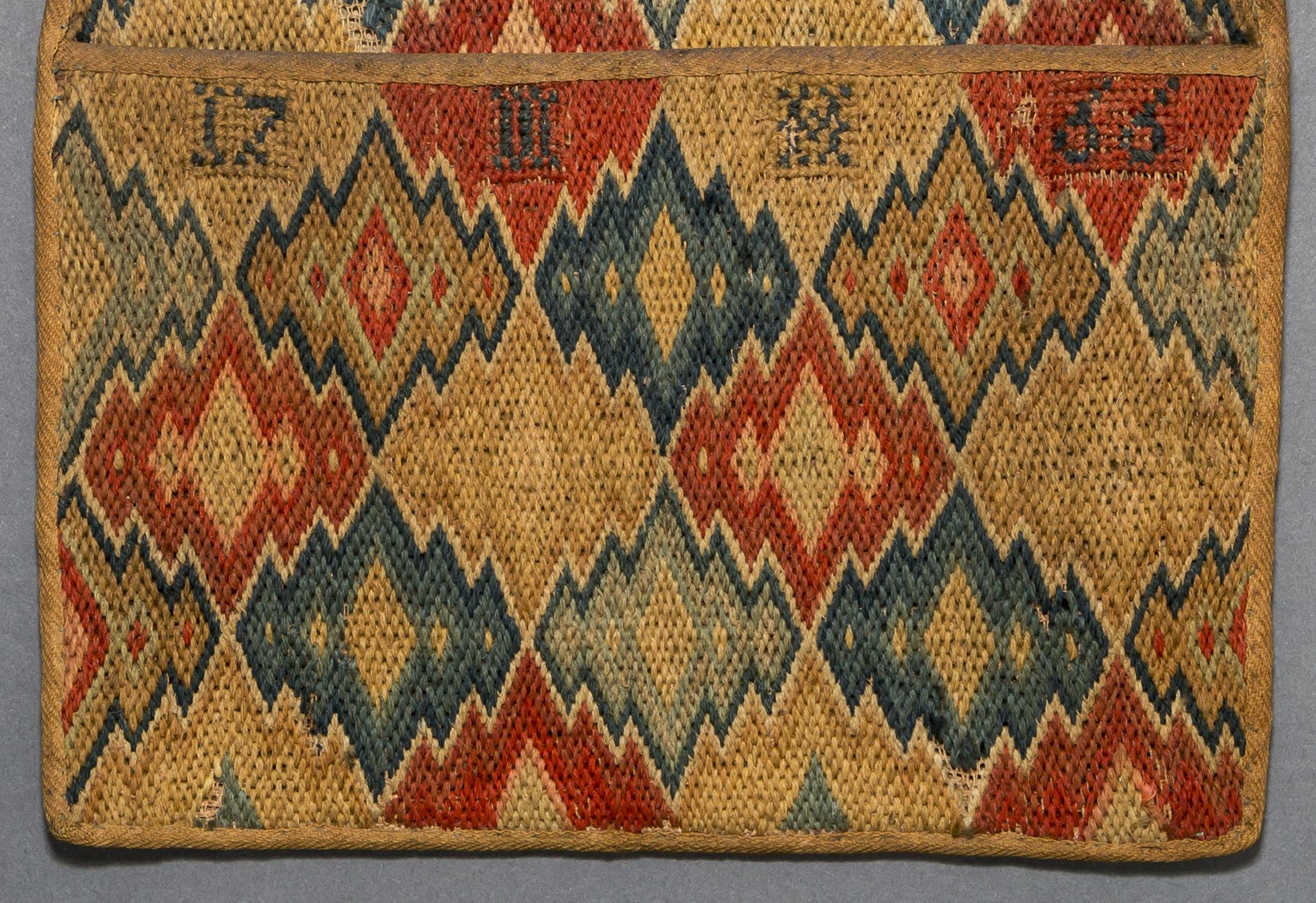 1958.1525 Wall pocket, detail 2