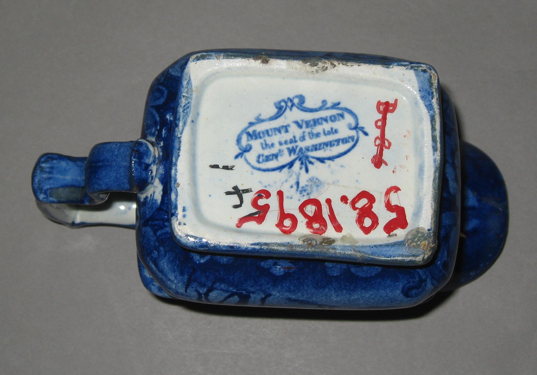 1958.1895 Cream pot (mark)