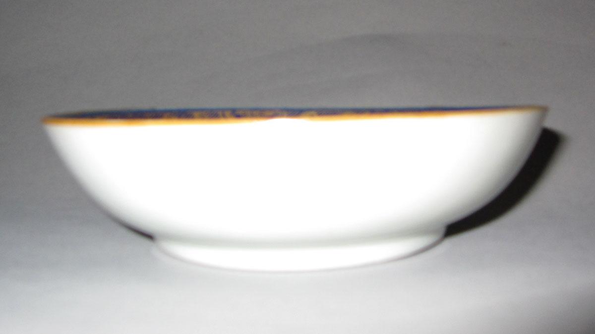 1958.1934.002 Porcelain saucer side