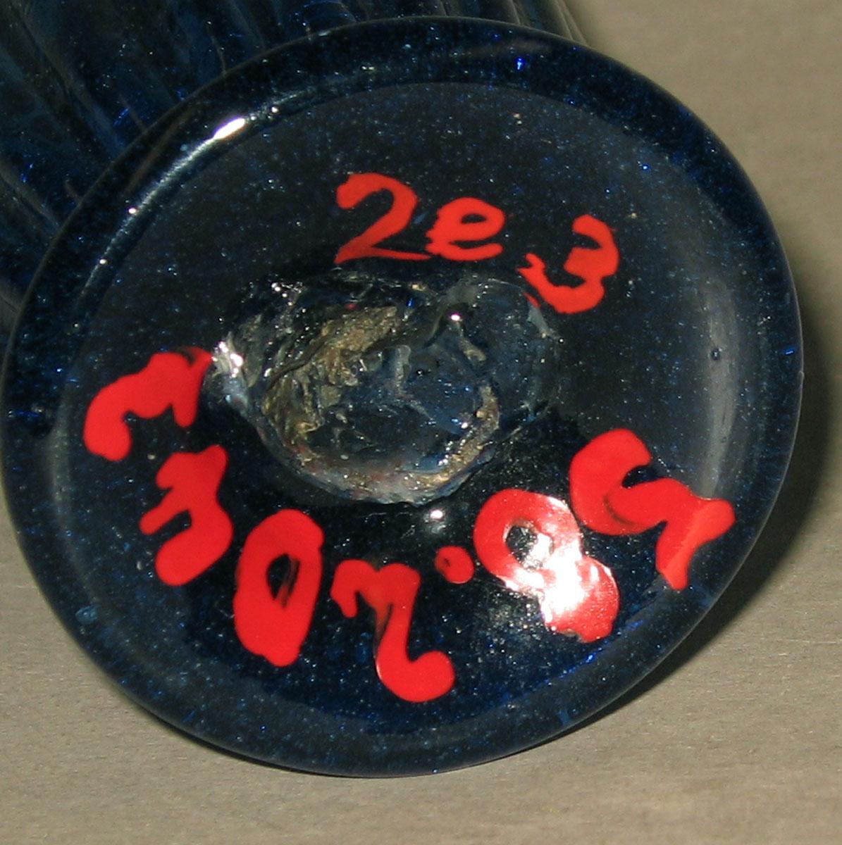 1958.2043 Glass bottle (underside)
