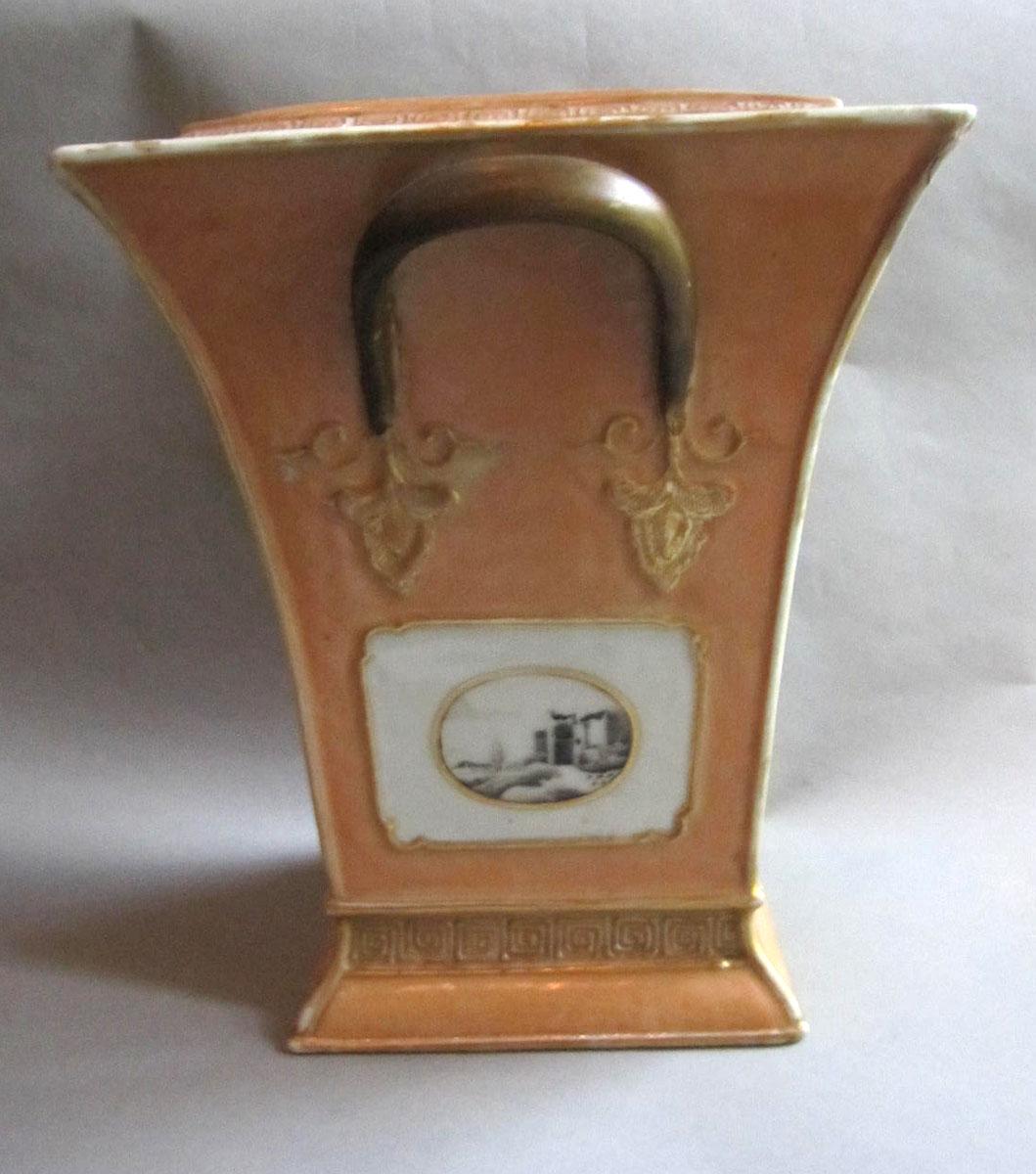 1958.2084.001 A,B Porcelain flower container face two