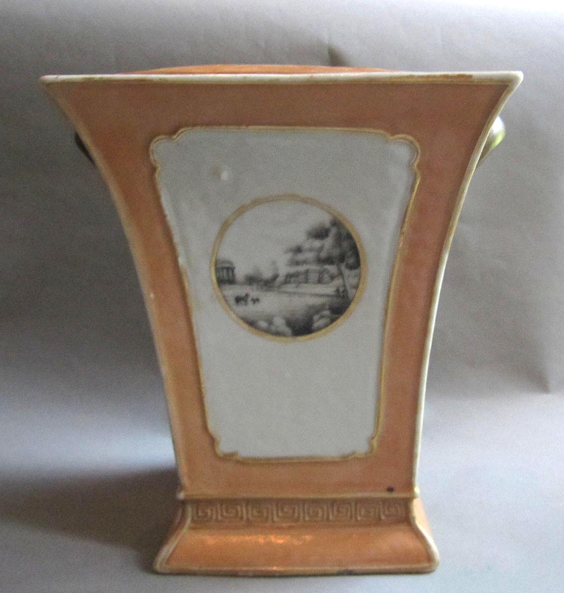 1958.2084.002 A,B Porcelain flower container face three