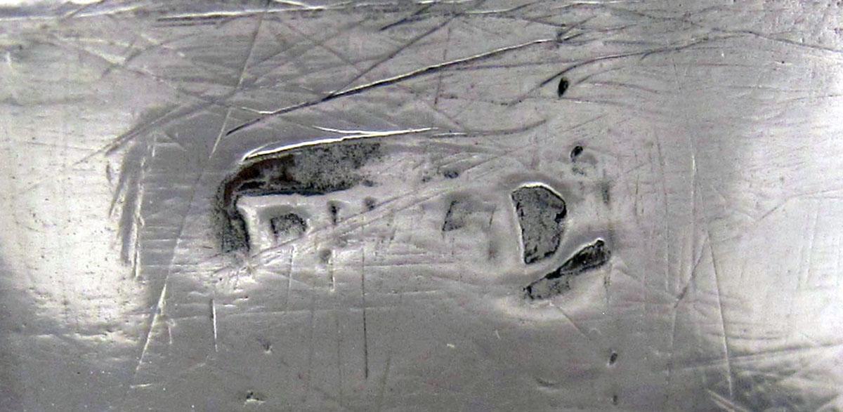 1958.2104 A, B Silver Dredger mark