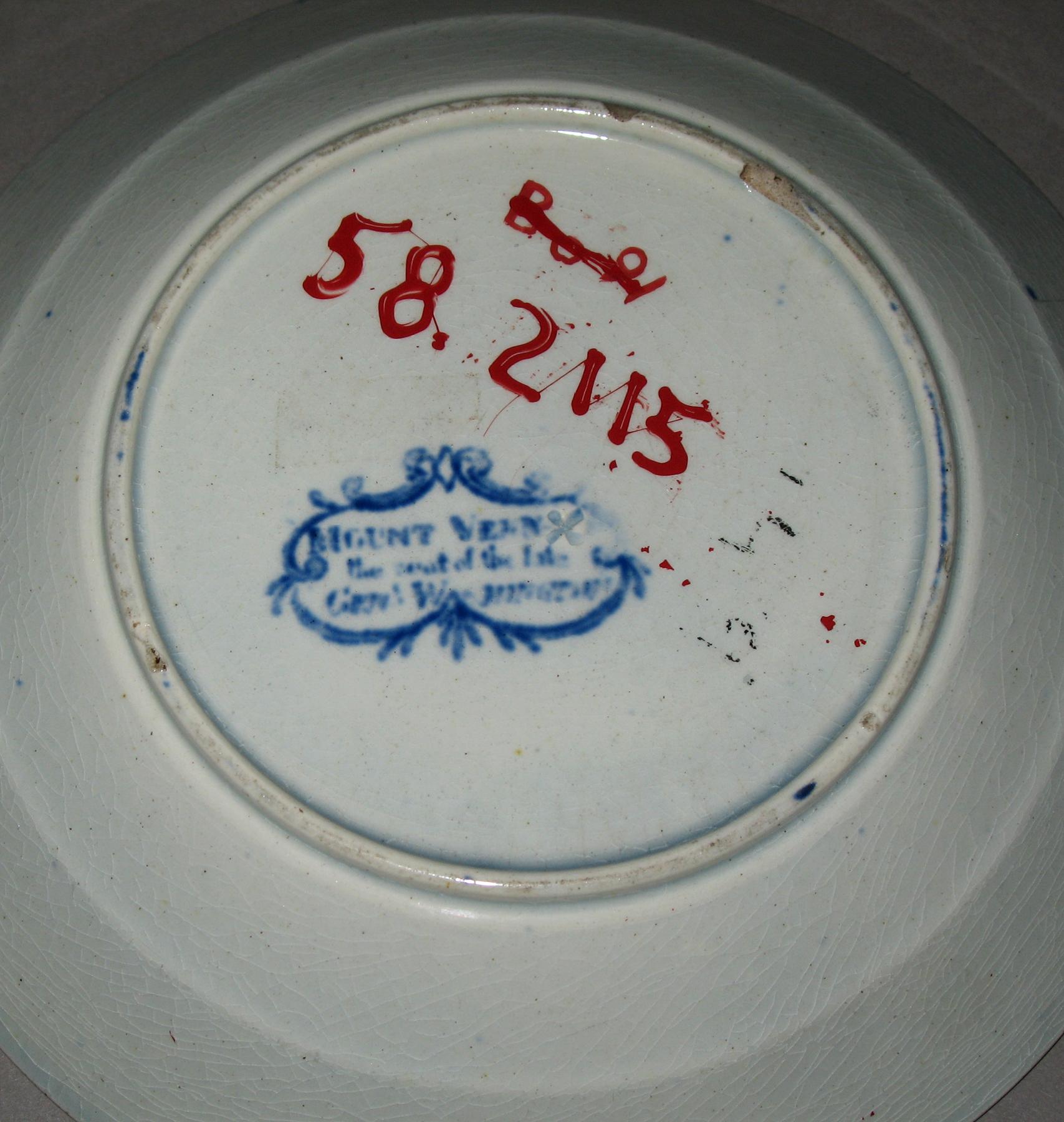 1958.2115 Saucer (mark)