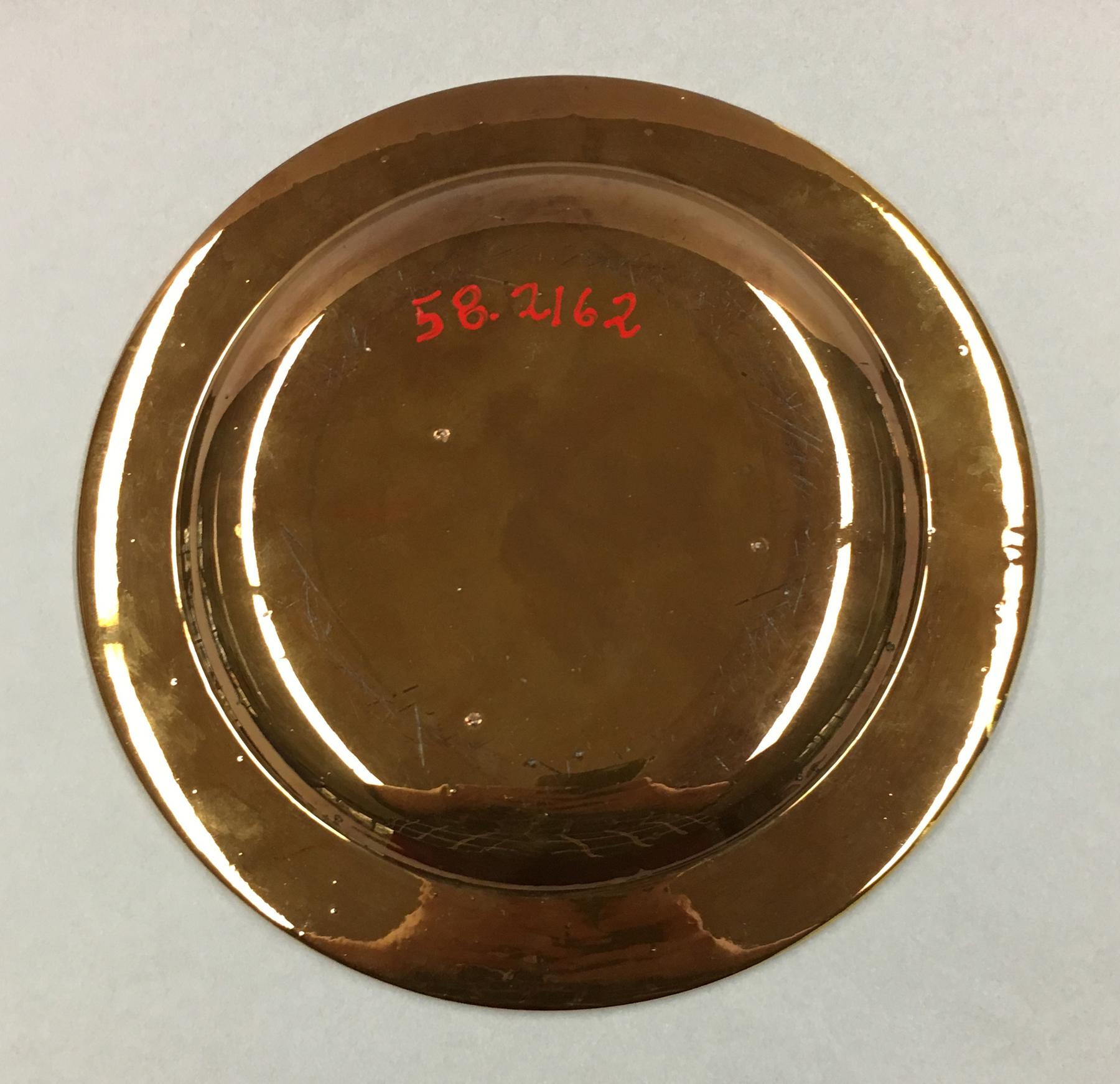1958.2162 Lusterware Plate, underside