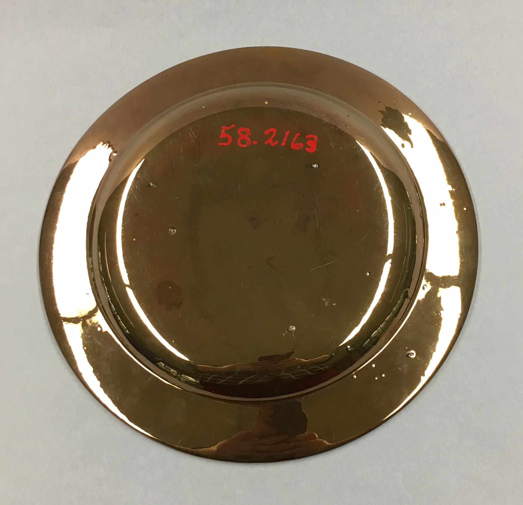 1958.2163 Lusterware Plate, underside