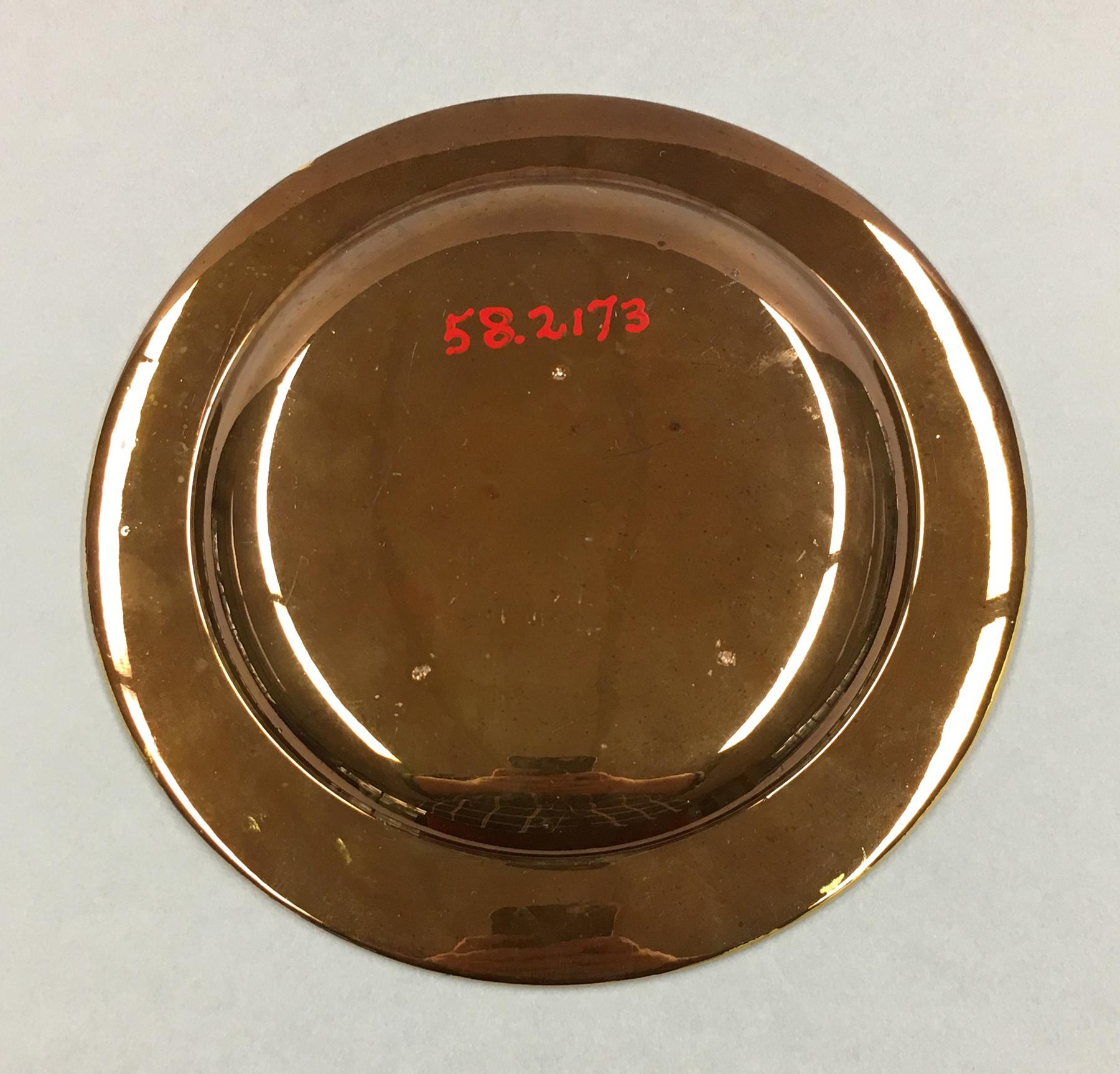 1958.2173 Lusterware plate, underside