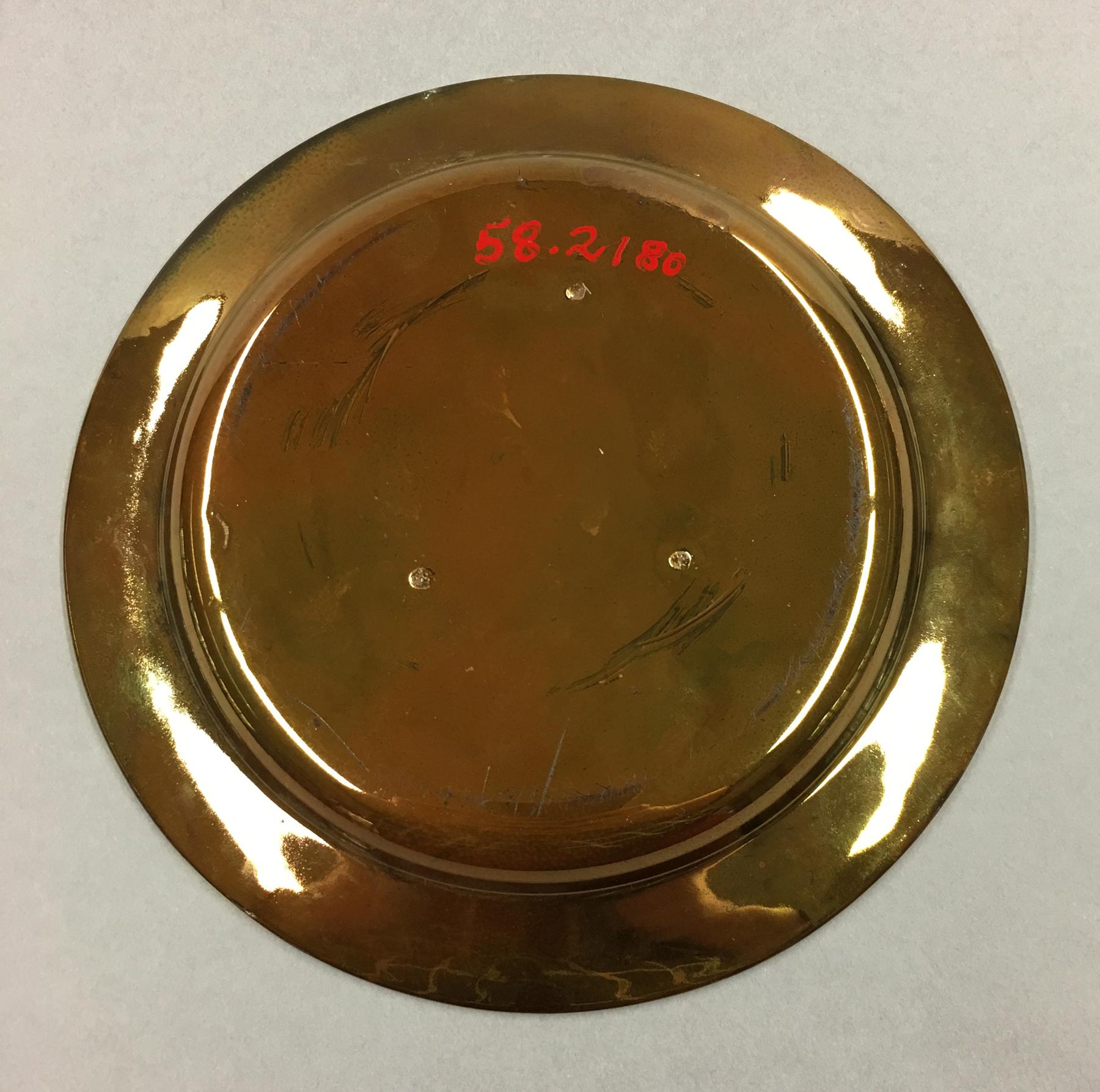 1958.2180 Lusterware plate, underside