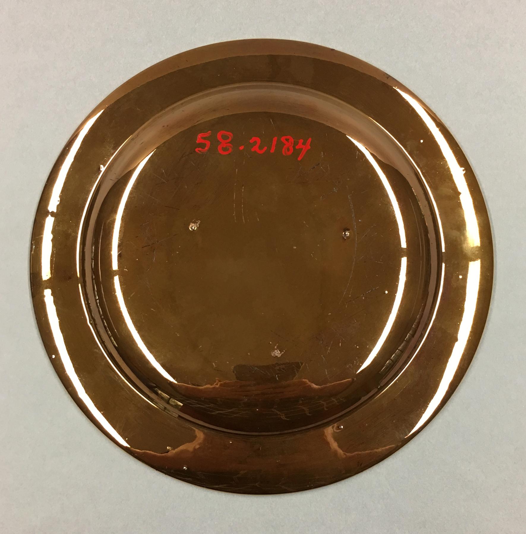 1958.2184 Lusterware plate, underside