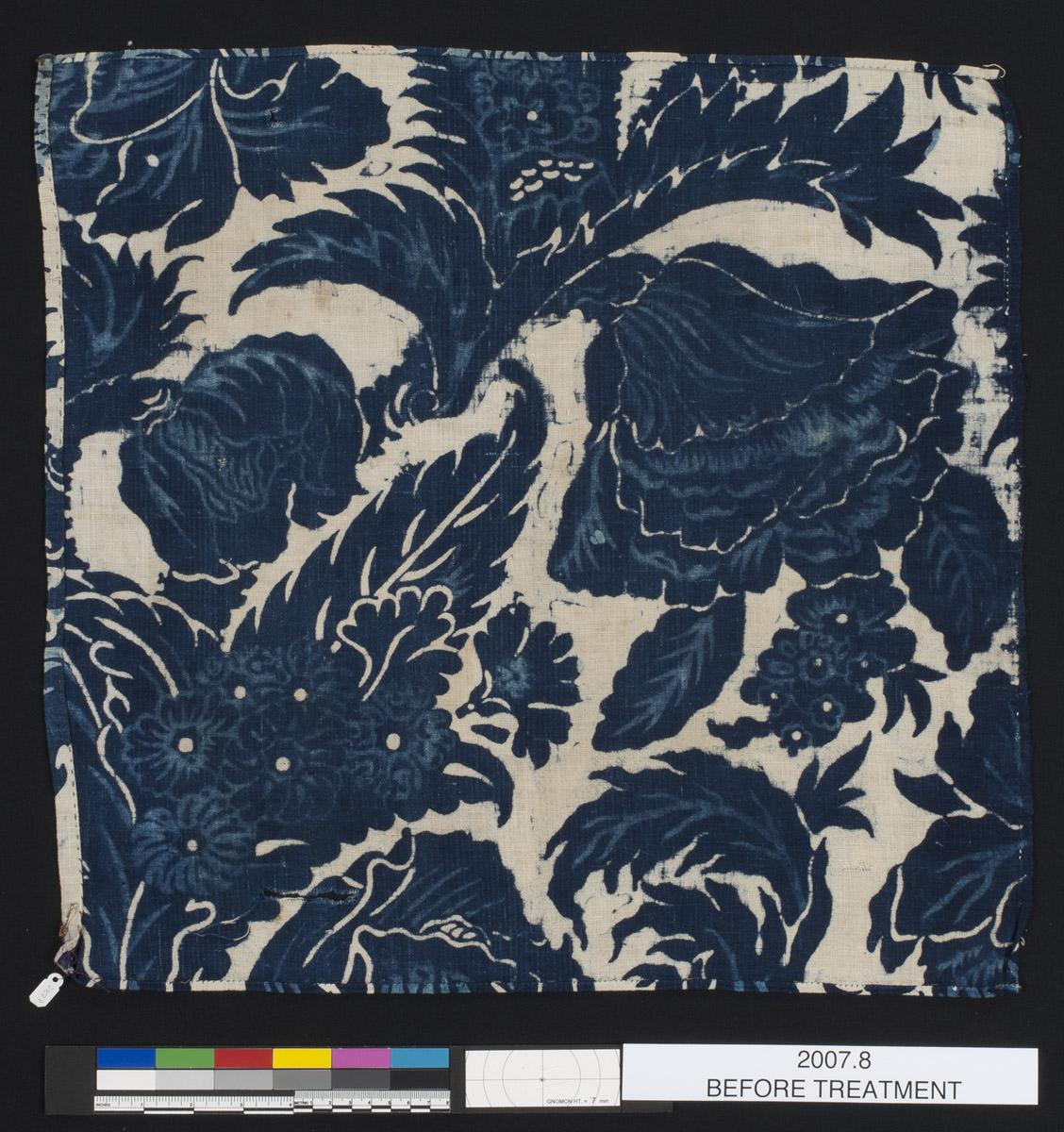 2007.0008 Textile, printed, reverse, before conservation treatment