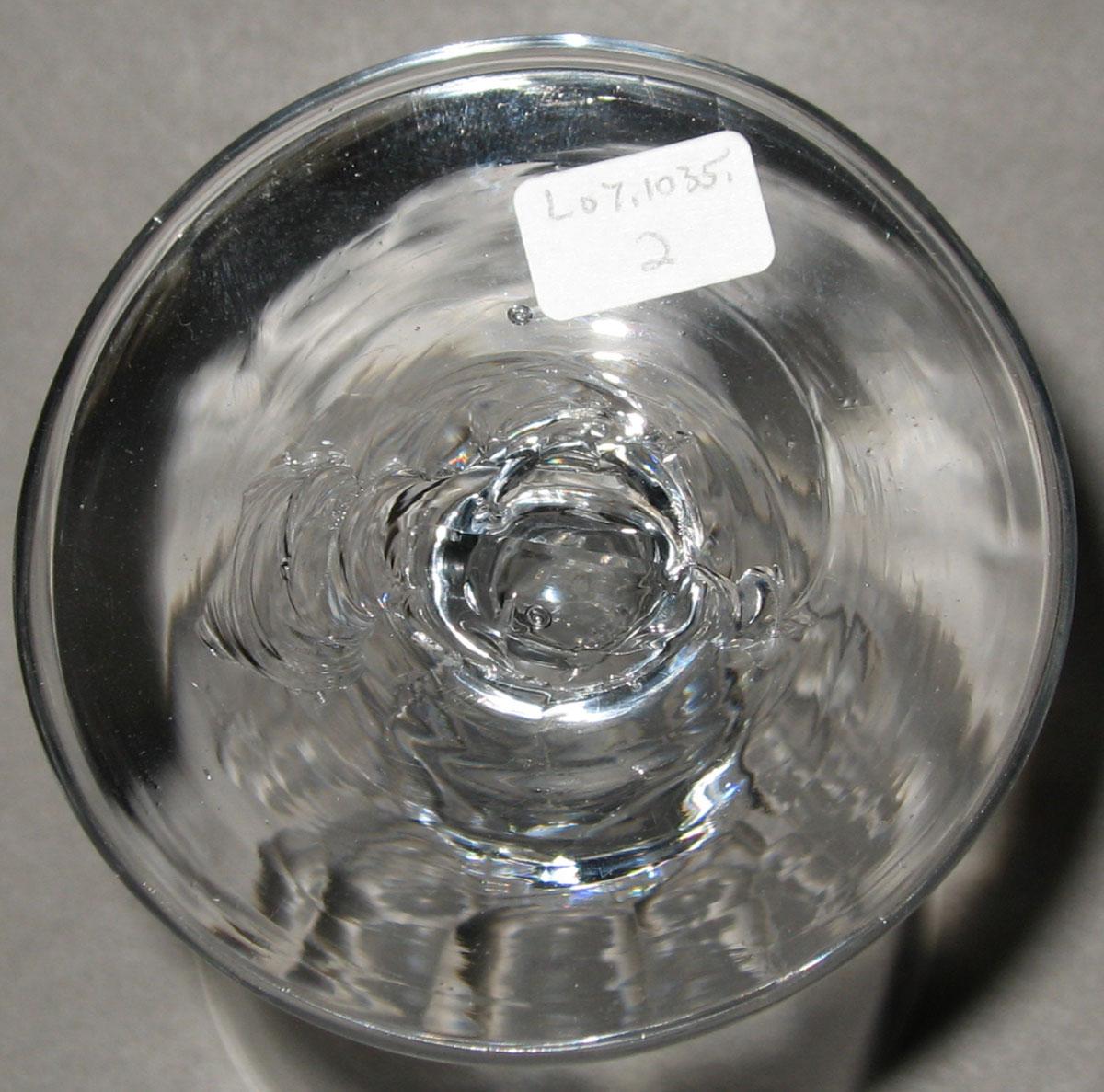 2007.0023.002 Colorless glass faceted stem wineglass (underside)