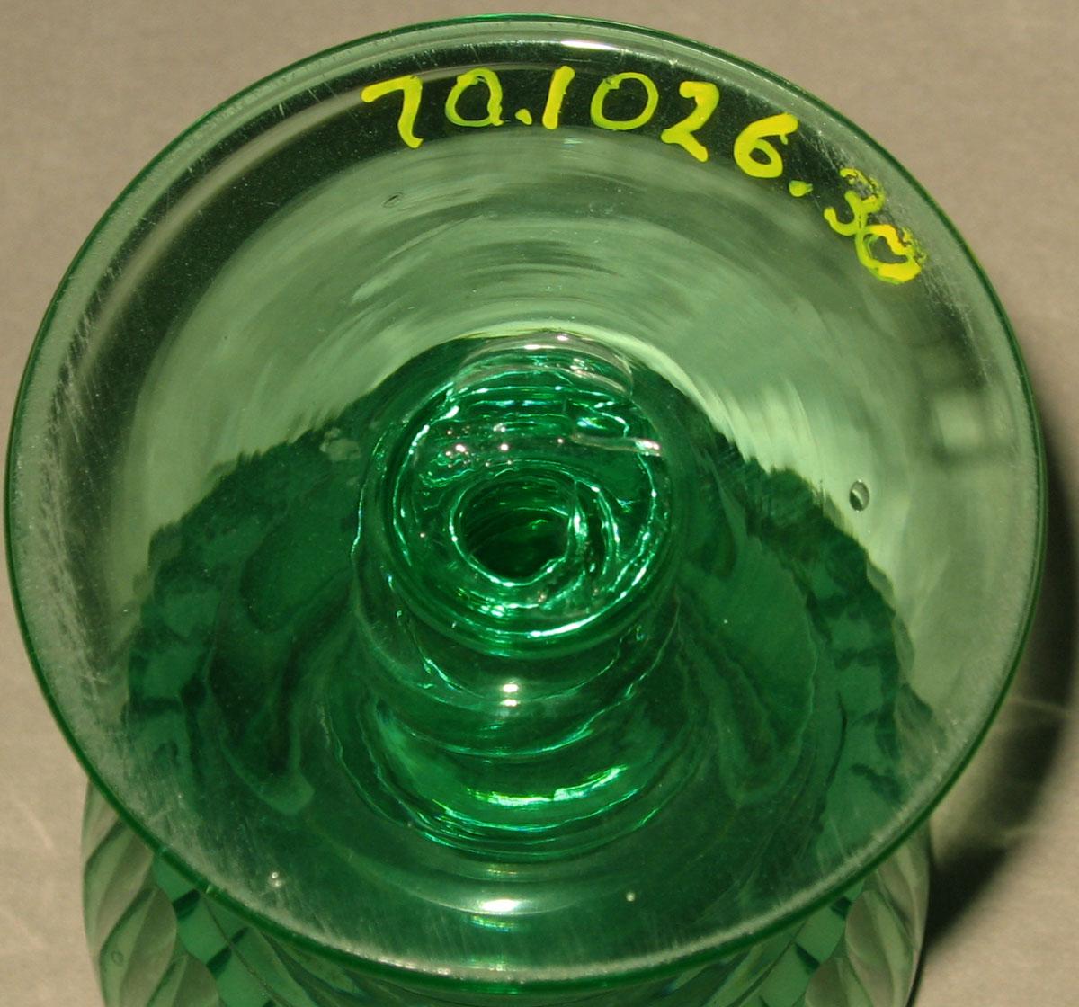 1970.1026.030 Green glass wineglass (underside)