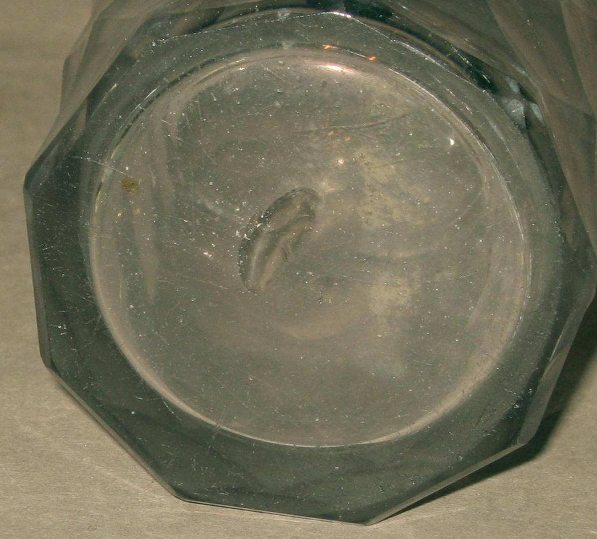 1975.0269 D Glass cruet bottle (underside)