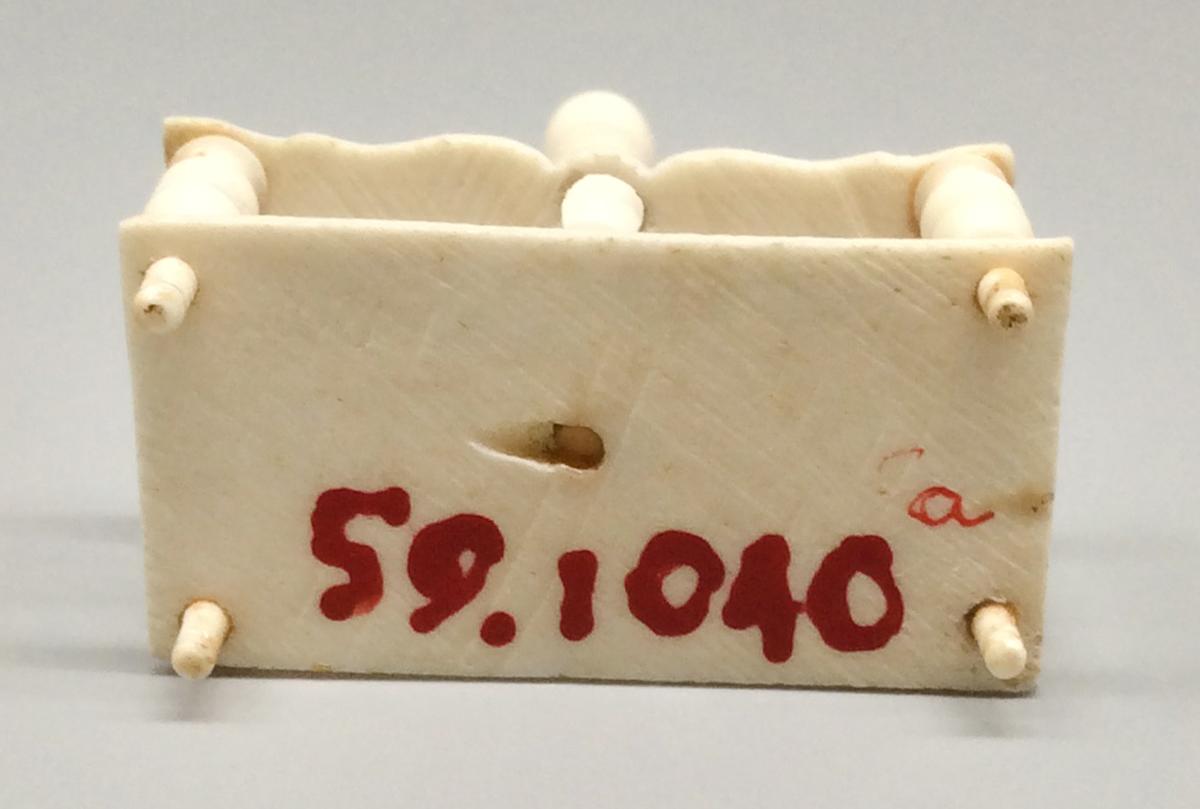 1959.1040 A Cruet frame, view 4