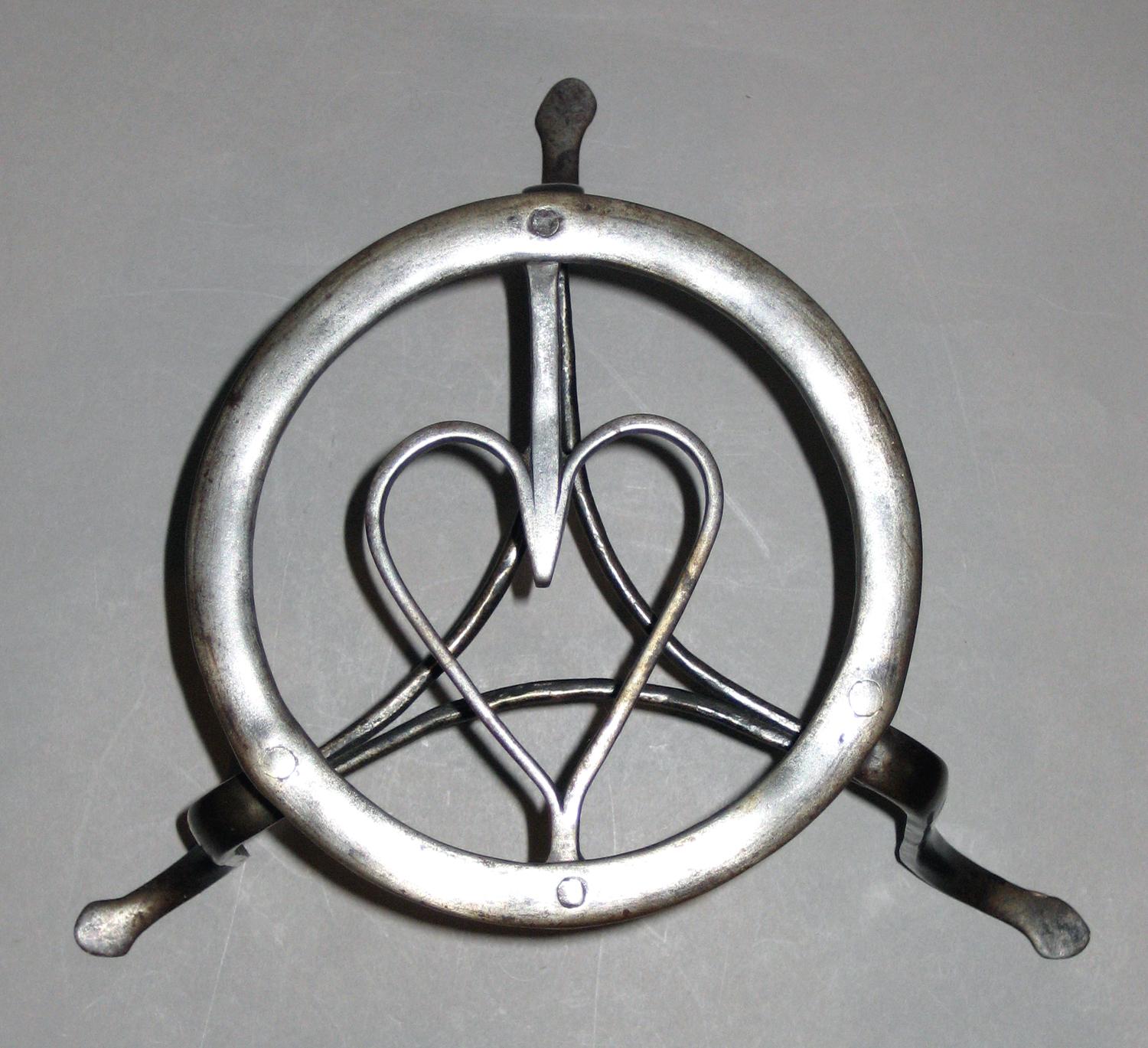 1958.2340 Trivet (detail)