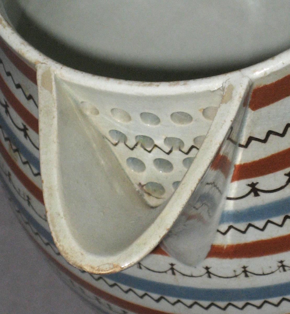 2007.0028.012 Dipped ware jug (lip detail)