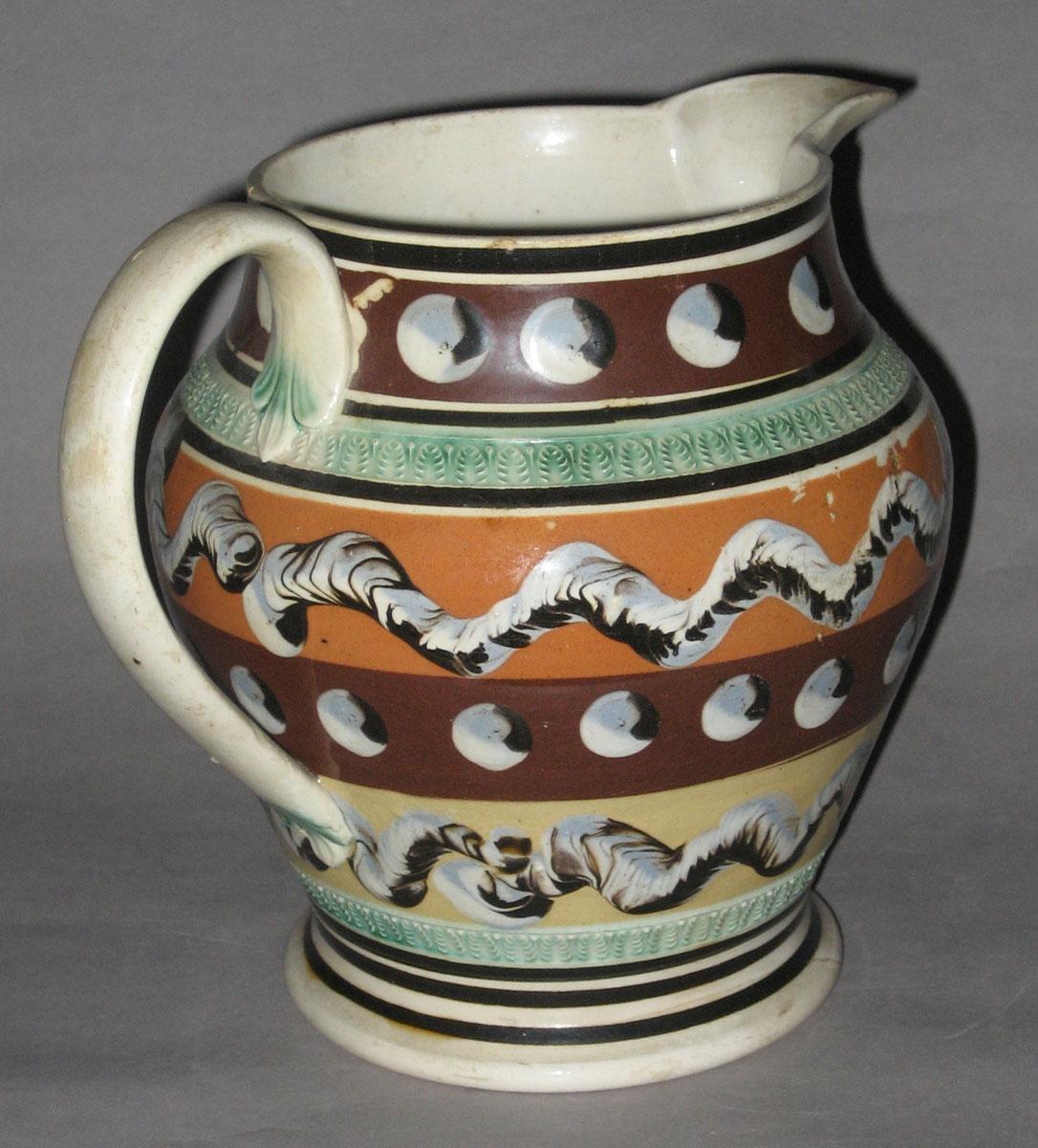 2007.0028.014 Dipped ware jug (handle view)
