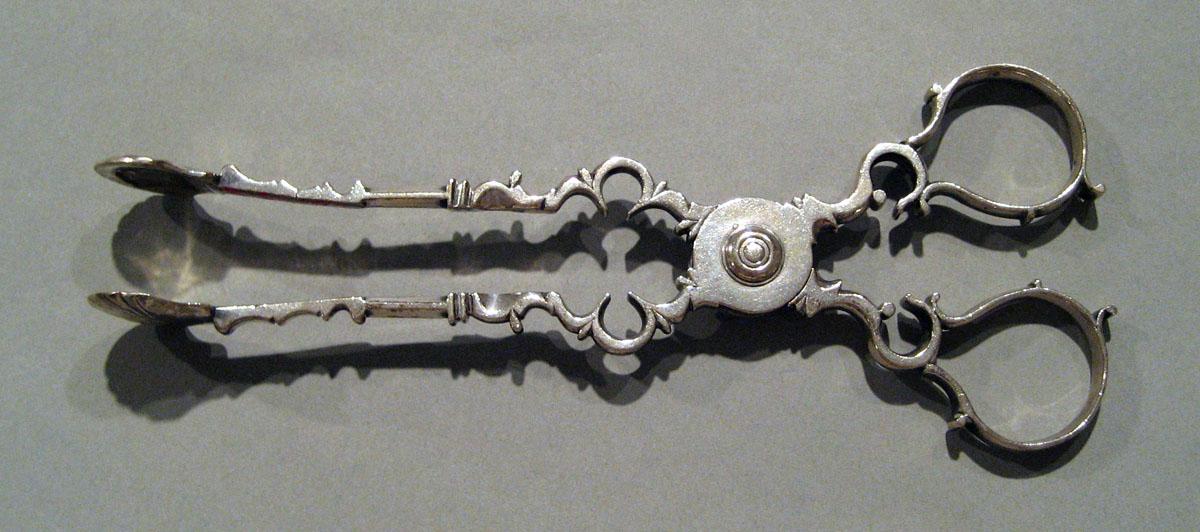 2008.0045.003 Silver Sugar Tongs side 1