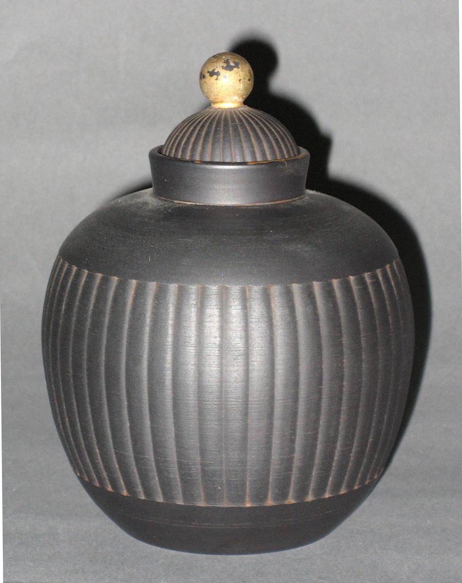 2008.0012.005 A, B Basalt tea canister