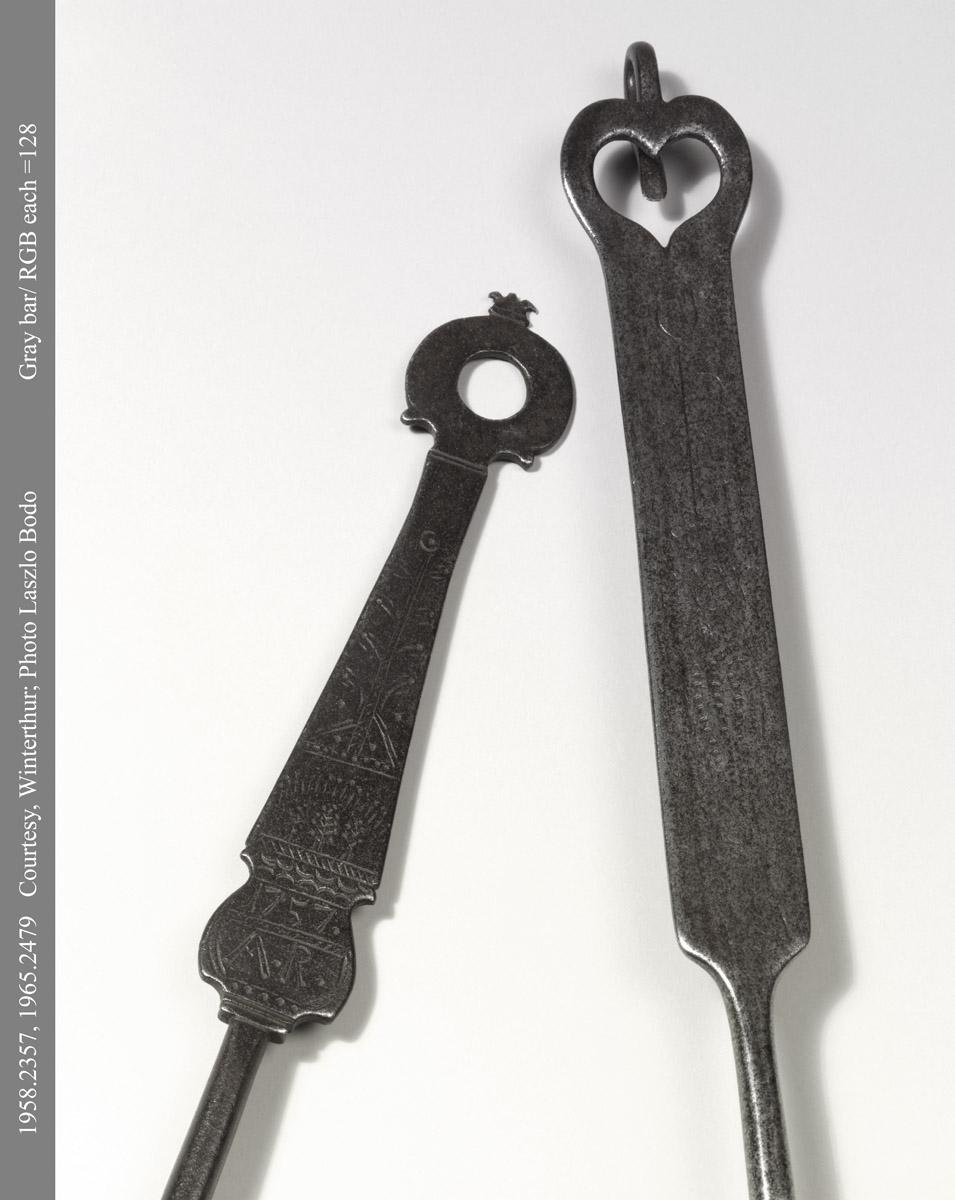1958.2357, 1965.2479 Forks (detail of handles)