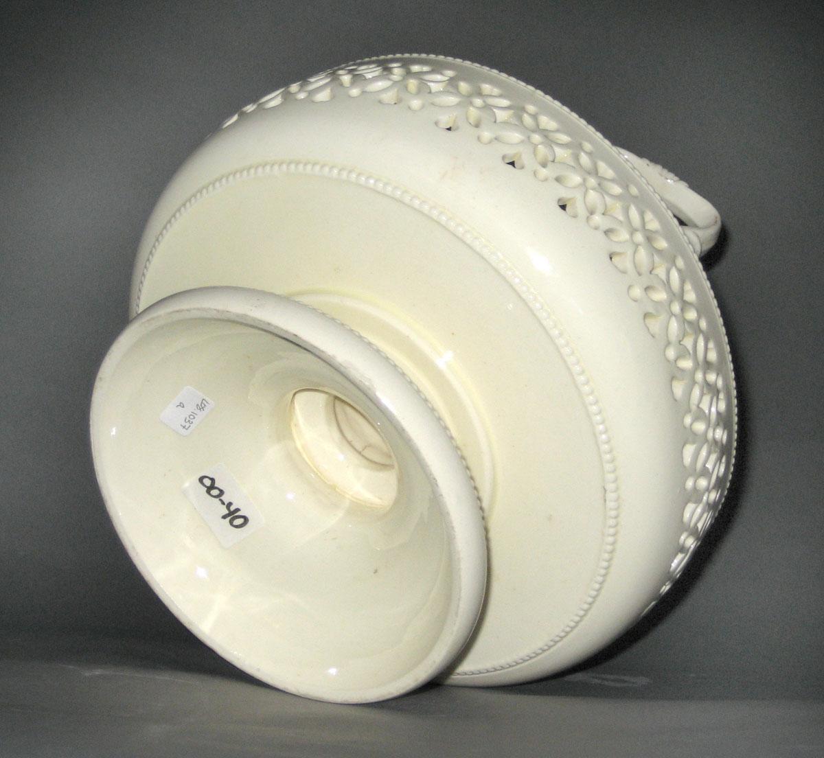 2008.0031 A Creamware cruet stand bottom