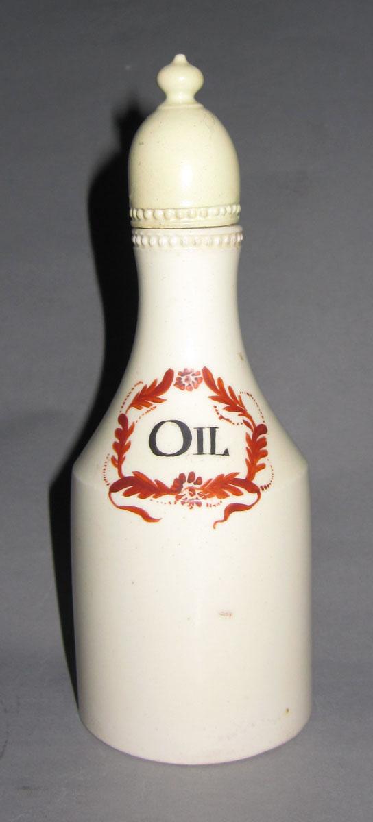 2008.0031 F,G Creamware bottle and lid