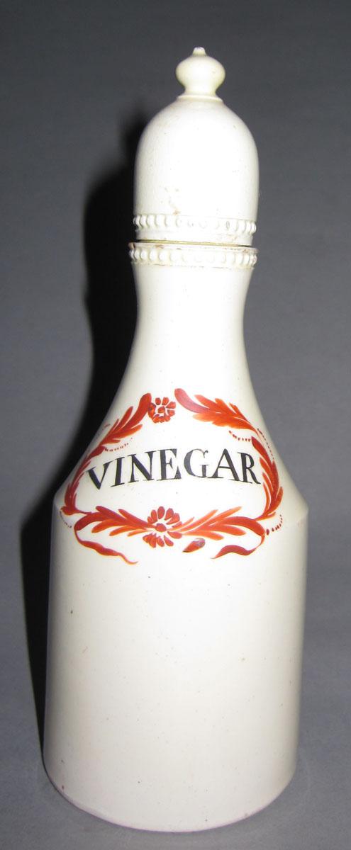 2008.0031 H,I Creamware bottle and lid