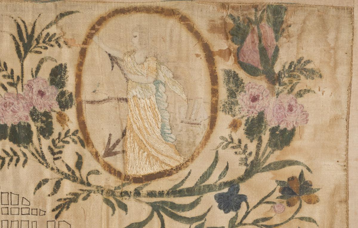 2008.0057 A Sampler, detail 1, after conservation treatment