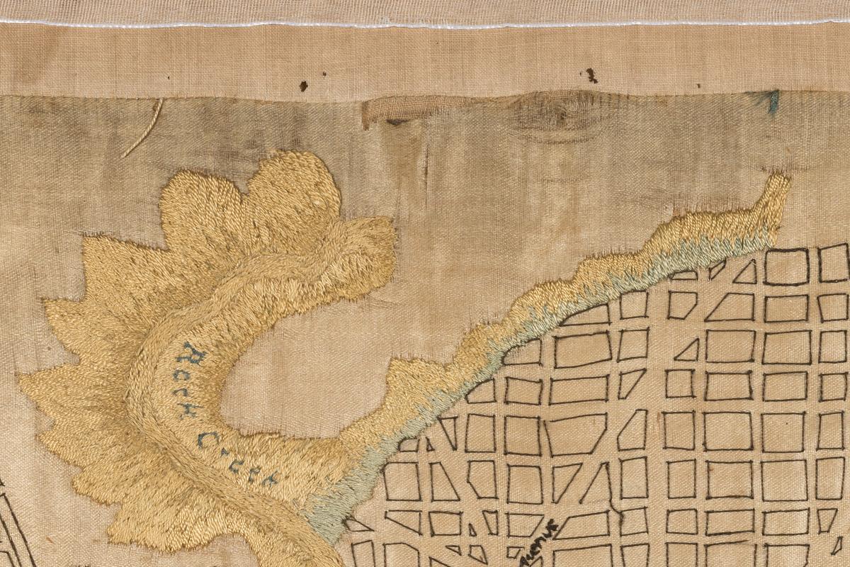 2008.0057 A Sampler, detail 2, after conservation treatment
