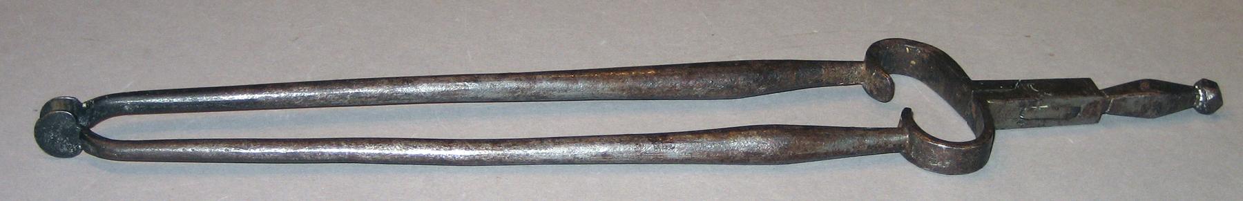 1958.2375 Tongs