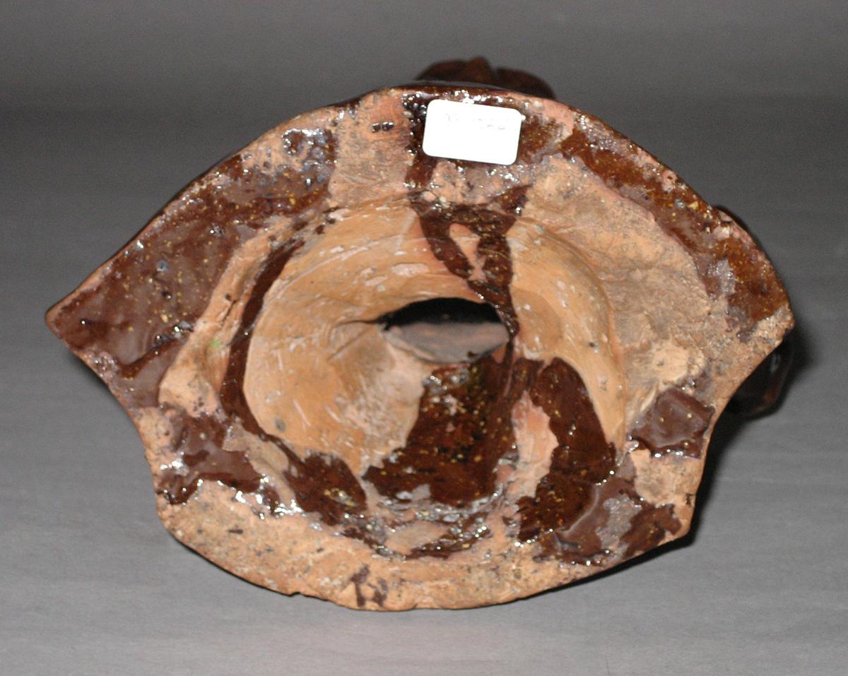2009.0027 Redware bust of Milton bottom 2