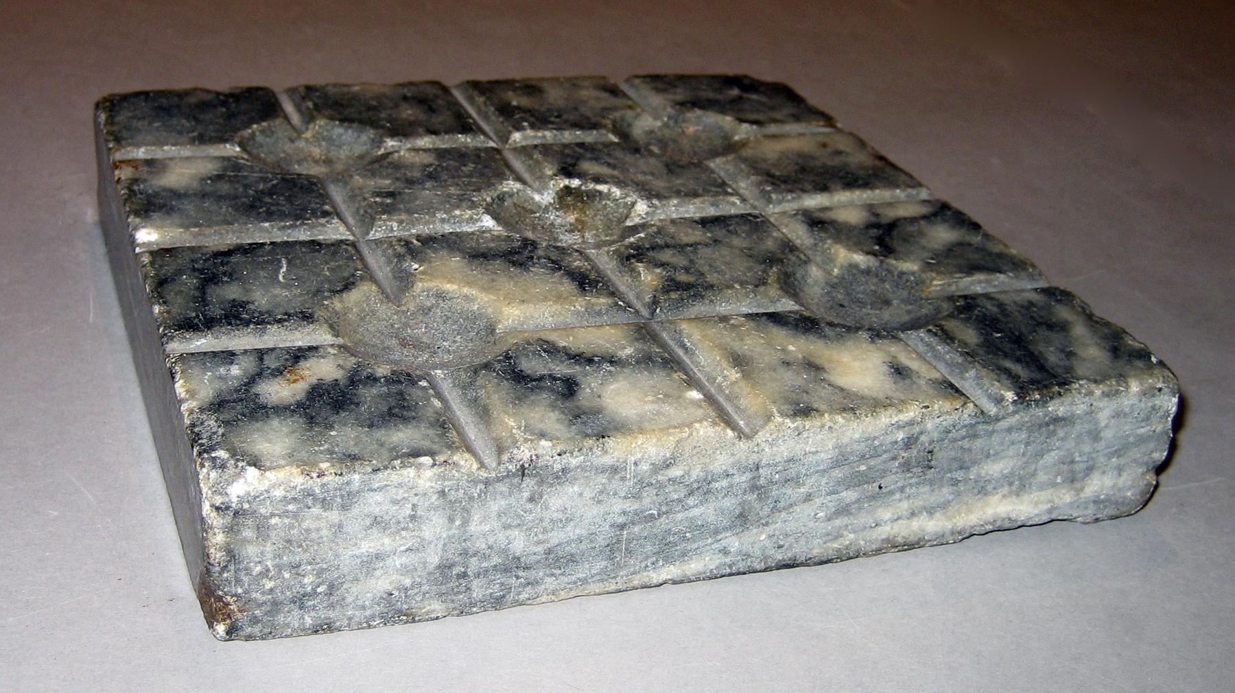 1958.2482 Tong stone