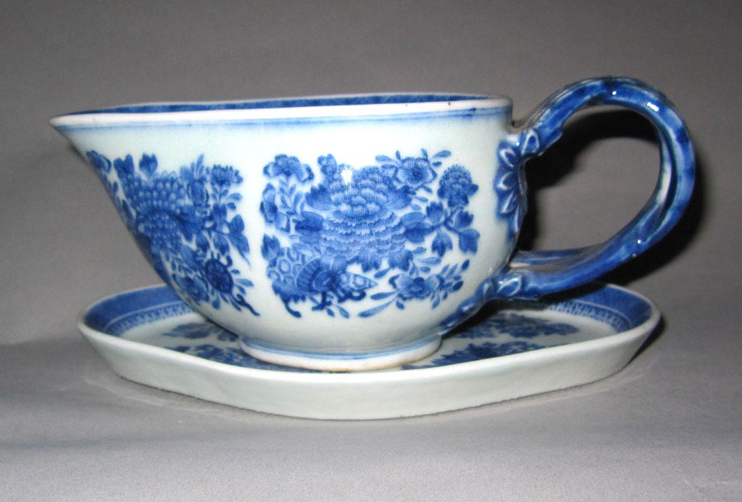 2010.0008.130 A, B Porcelain sauceboat and stand
