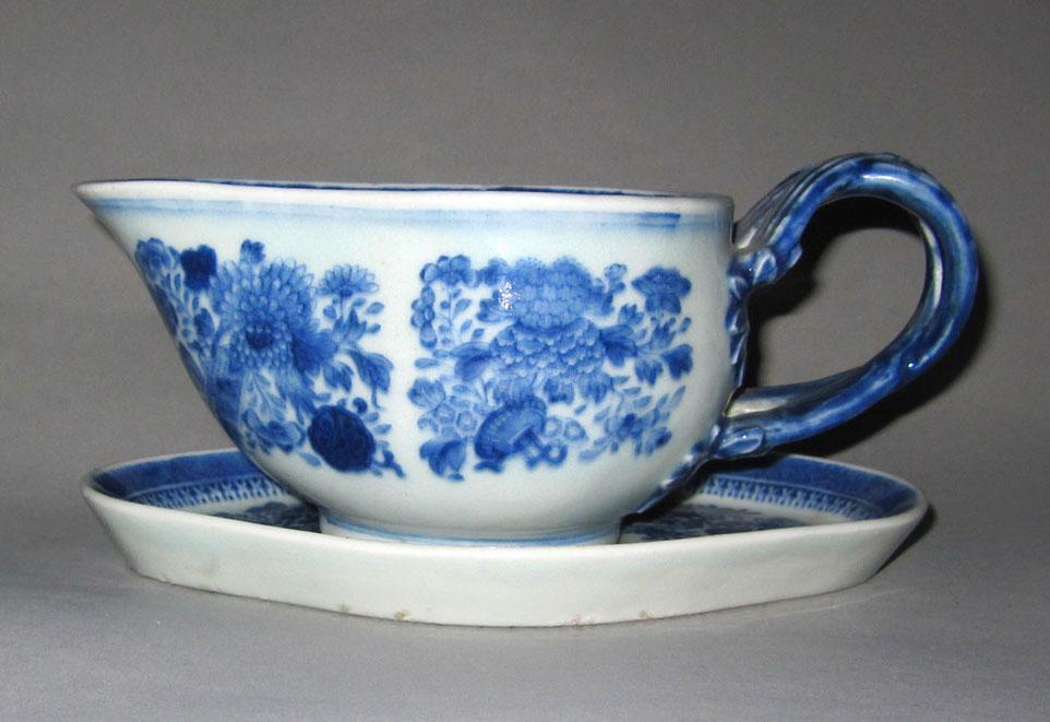 2010.0008.131 A,B Porcelain sauceboat and stand
