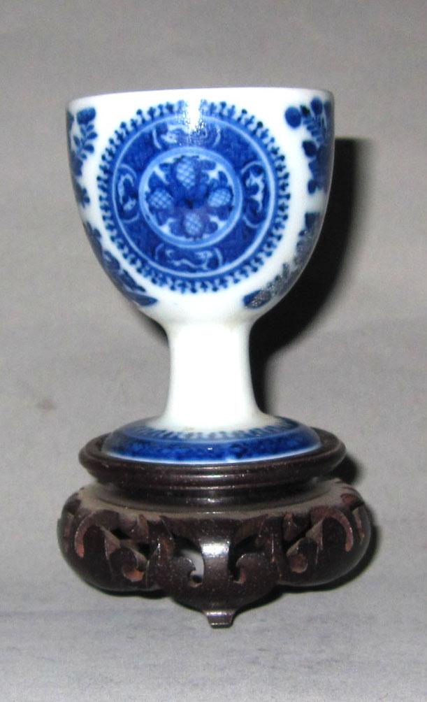 2010.0008.158 A,B Porcelain egg cup and stand