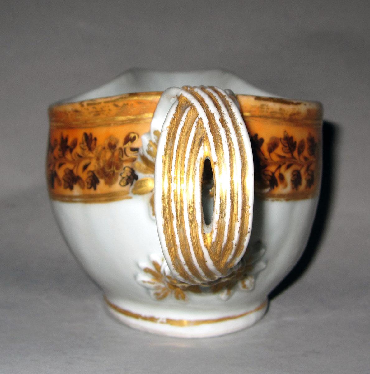 1958.2499 Porcelain sauceboat handle