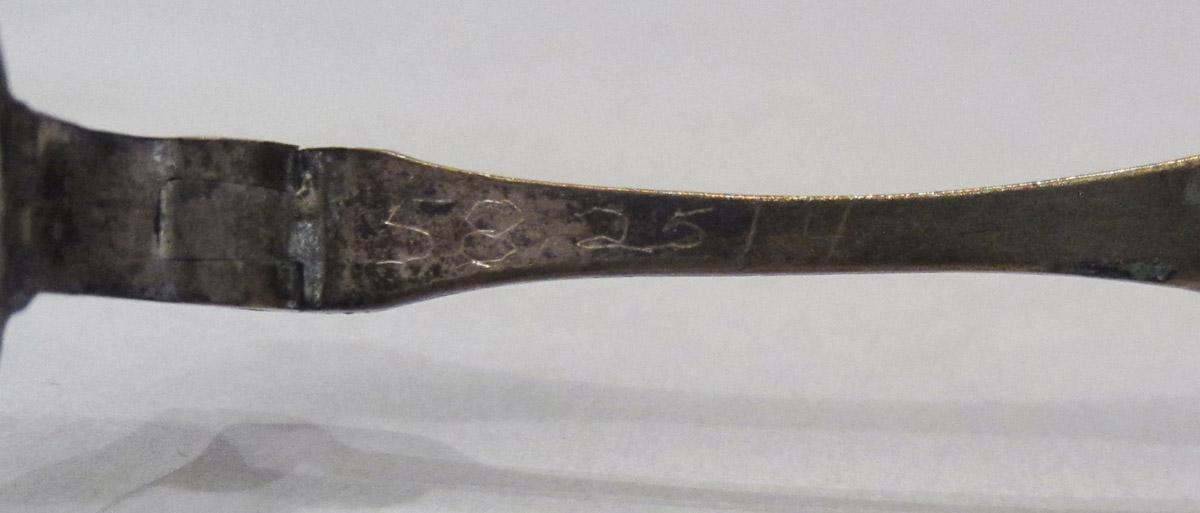 1958.2514 Spectacles, inscription