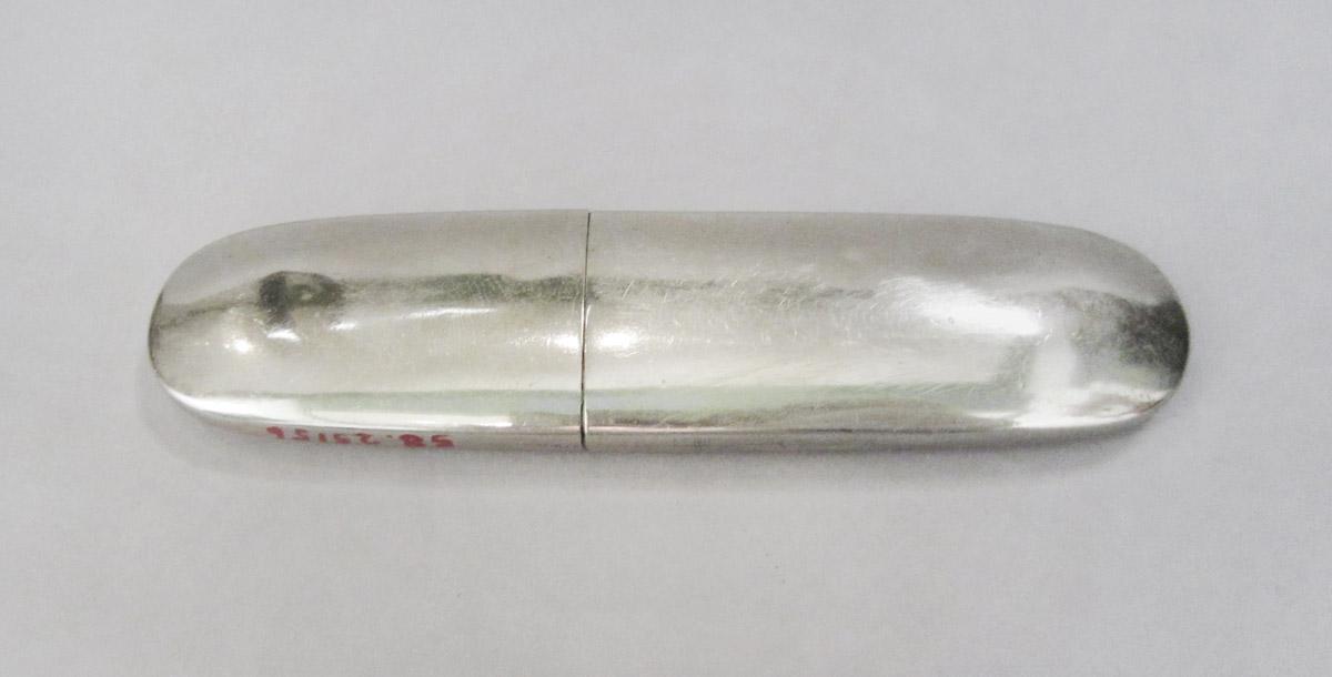 1958.2515 A, B Spectacles case, underside