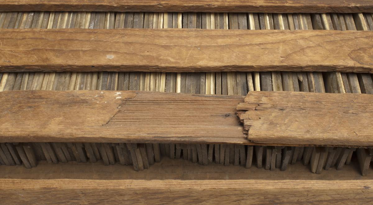 2010.0012.001 Comb blanks in frame (detail)