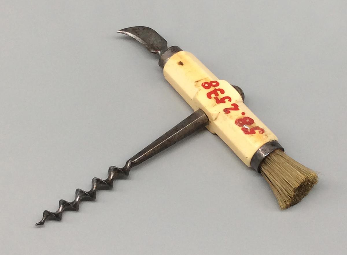 1958.2538 Corkscrew with brush, view2