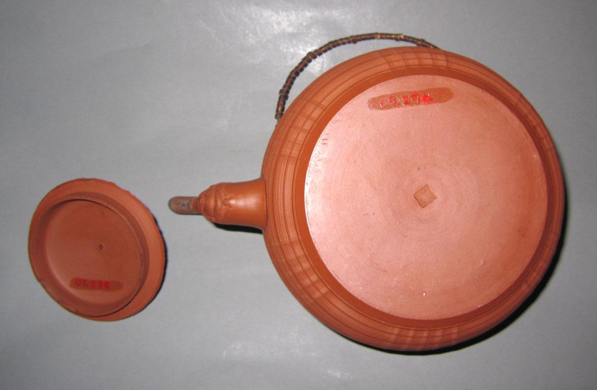 2009.0029 A,B Redware punch pot underside