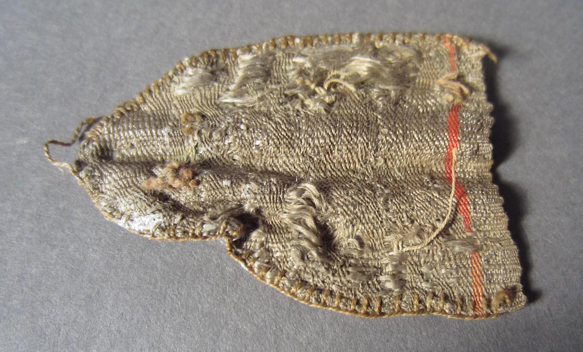 1959.0560 B Knitting sheath fragment, View 1