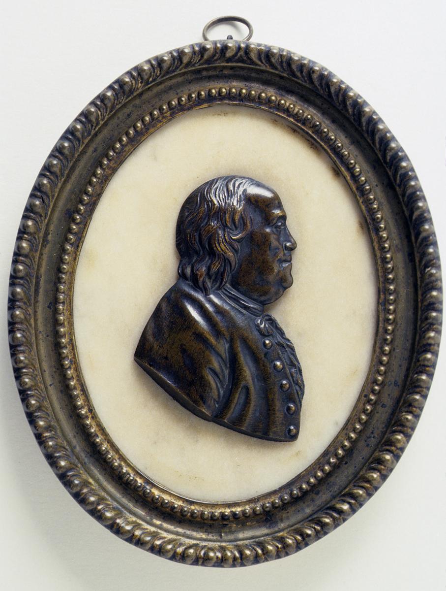 1958.2585 A, B Plaque and Frame