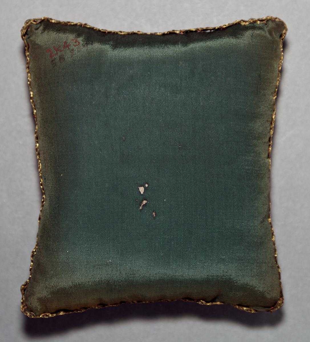 1958.2591 Pincushion, Verso